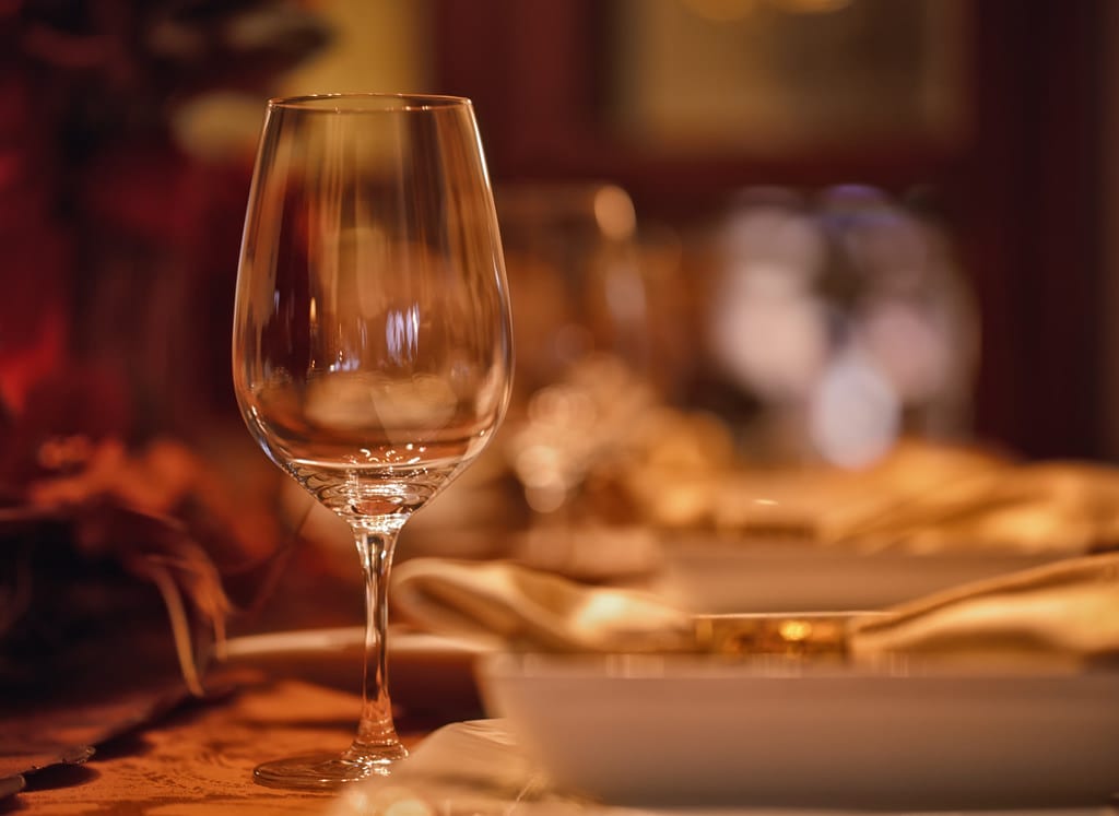 Empty wine glass for Thanksgiving Feast near El Bonita Motel
